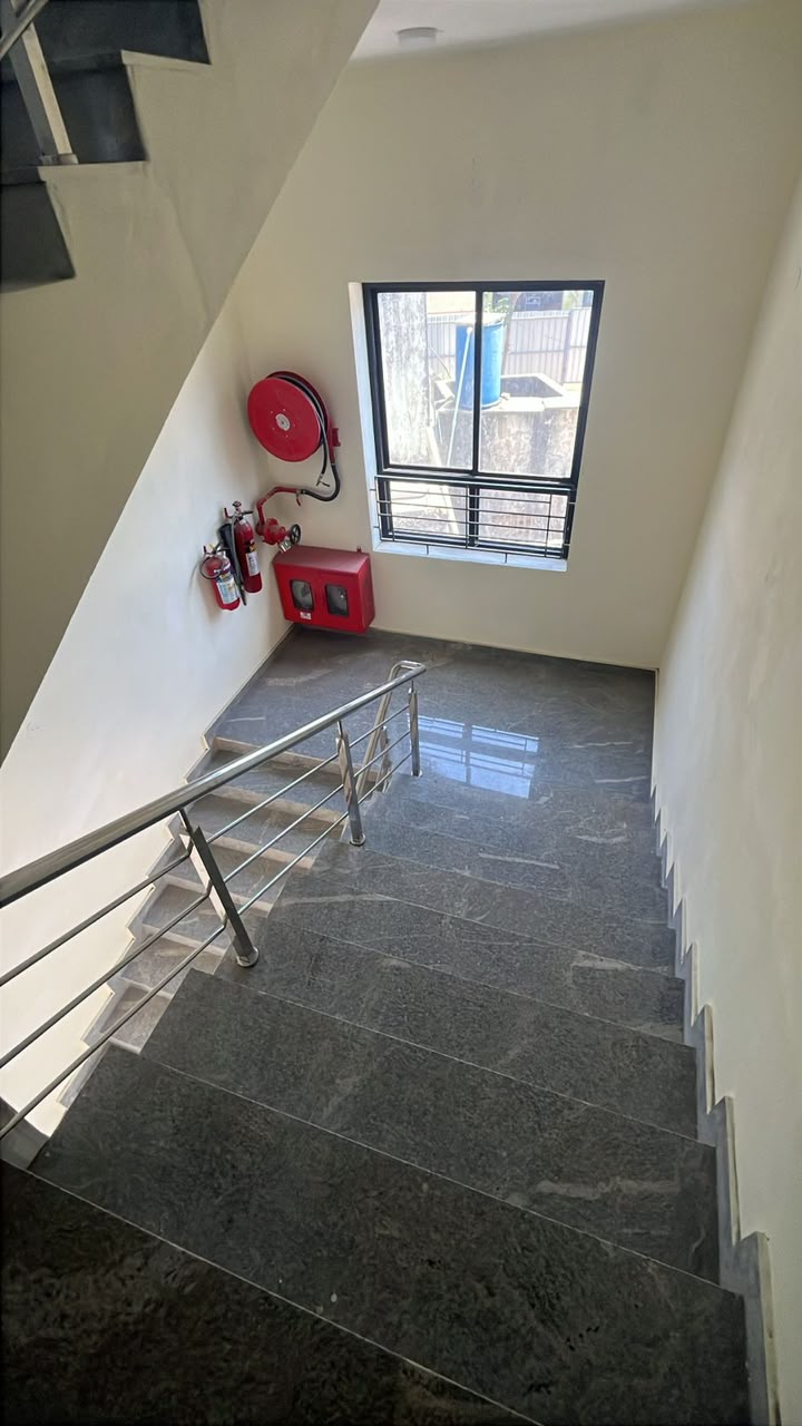Staircase with fire safety equipment